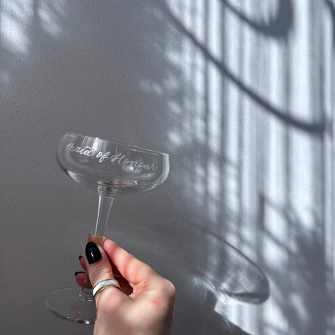 bridesmaid gifts.  engraved coupe glass. engraved champagne glass. bridal shop toronto