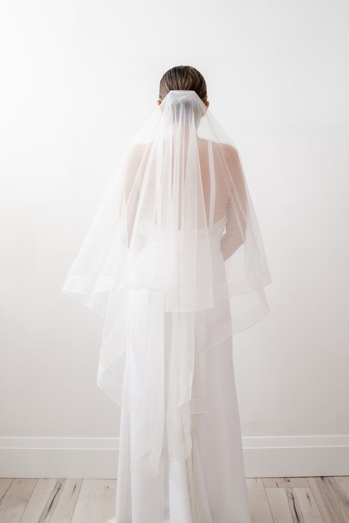 fingertip length veil.  tiered veil.  bridal accessories toronto